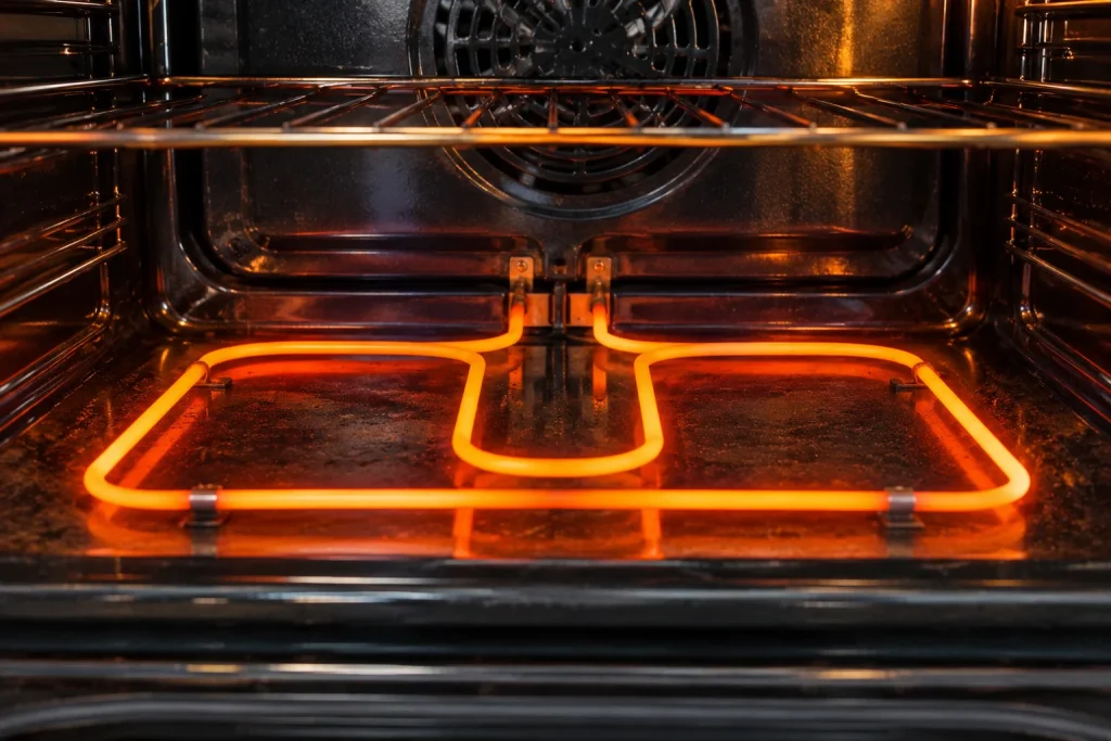 electric oven bake element glowing during normal heating